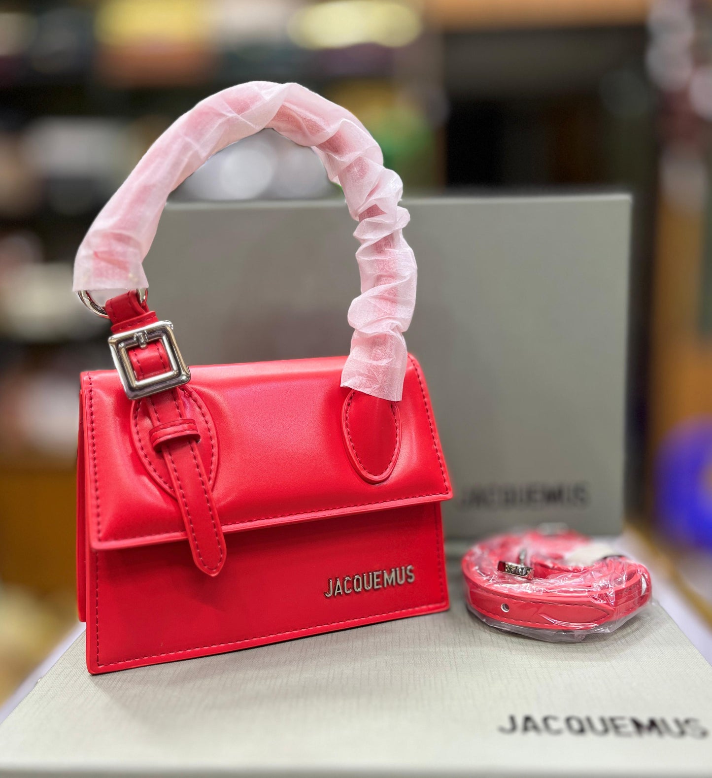 *Jacquemus*
Le Chiquito Moyen Boucle tote bag