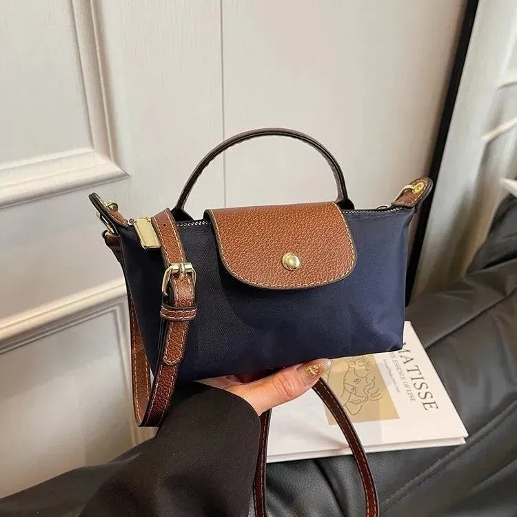 LONG CHAMP LE PLIAGE POUCH WITH HANDLE
Navy - Recycled Canvas